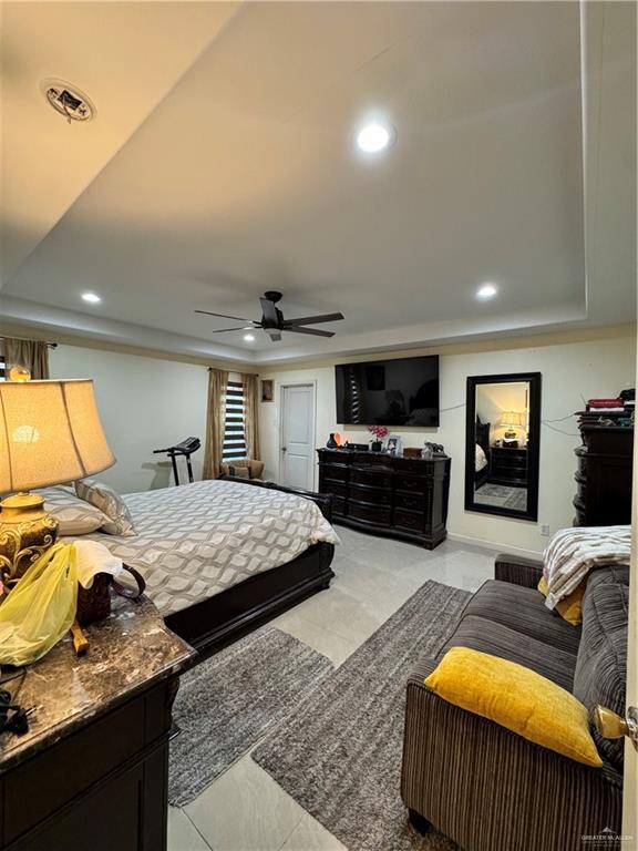 704 S 17th St, Hidalgo, TX 78557 - bedroom featuring tile patterned floors, recessed lighting, and ceiling fan