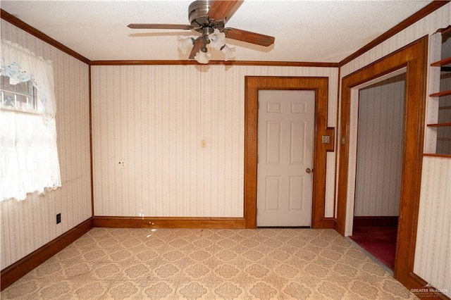 501 N Park Ave, Pharr, TX 78577 - empty room featuring crown molding, light carpet, ceiling fan, wallpapered walls, and a textured ceiling
