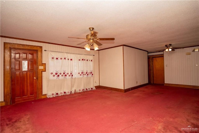 unfurnished living room with ceiling fan, ornamental molding, and a textured ceiling