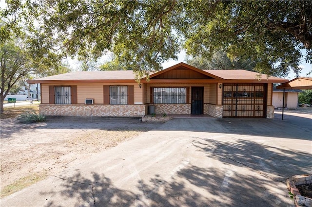 501 N Park Ave, Pharr, TX 78577 - ranch-style house featuring a garage, brick siding, and concrete driveway