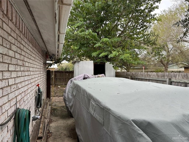 view of property exterior featuring a hot tub