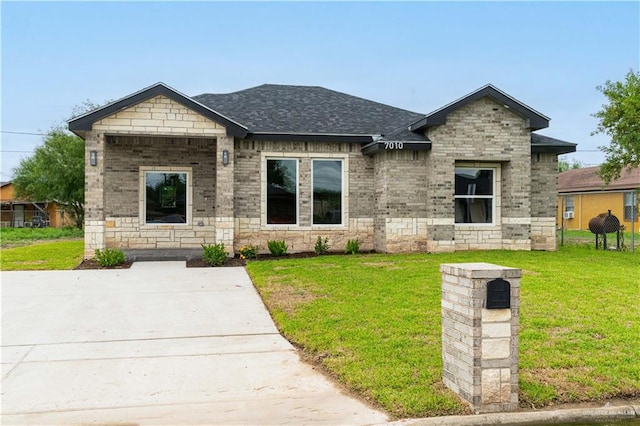 view of front of property with a front lawn