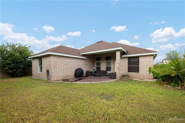 back of house featuring an outdoor living space, a yard, and a patio area