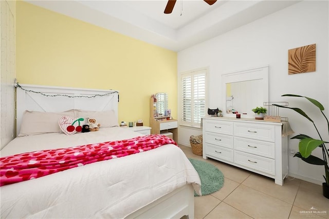 bedroom featuring light tile patterned floors and ceiling fan