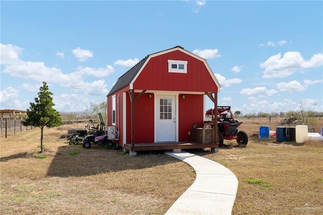 view of outdoor structure with a lawn