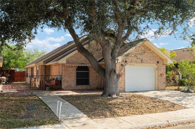 ranch-style house featuring a garage