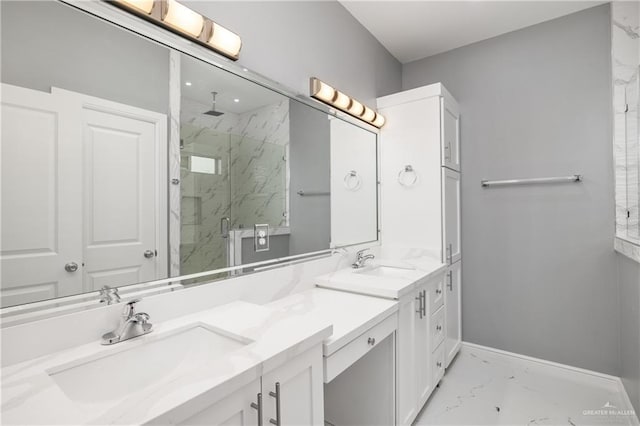 bathroom with a shower with door and vanity