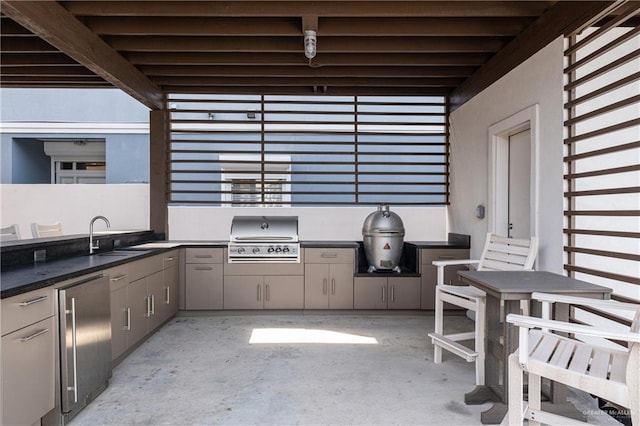 5705 Laguna Cir S, South Padre Island, TX 78597 - view of patio / terrace with a sink and area for grilling
