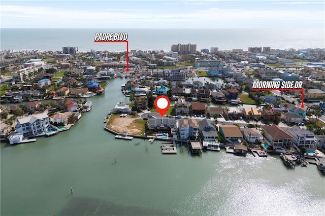 5705 Laguna Cir S, South Padre Island, TX 78597 - drone / aerial view with a residential view and a water view