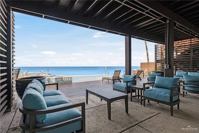 5705 Laguna Cir S, South Padre Island, TX 78597 - view of patio / terrace featuring outdoor lounge area and a water view