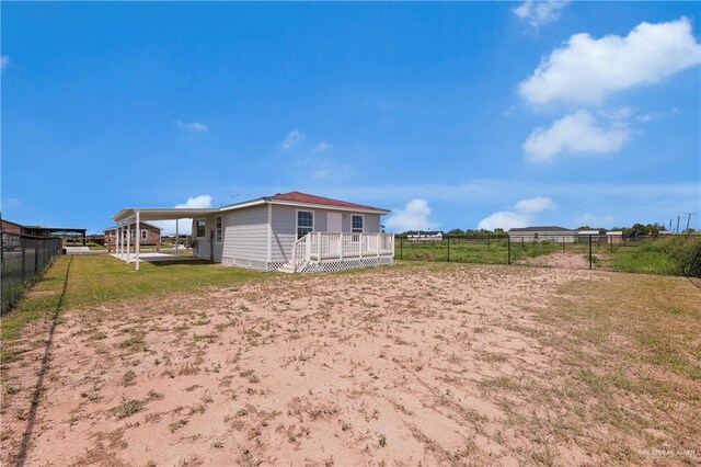 view of yard featuring a carport