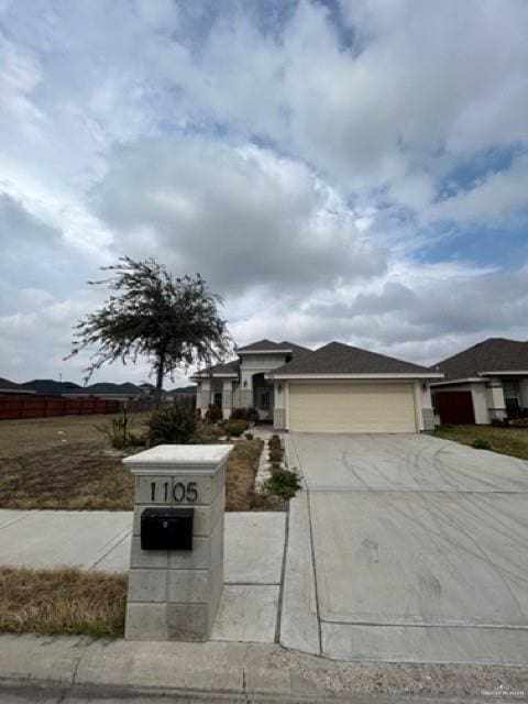 view of front of property featuring a garage