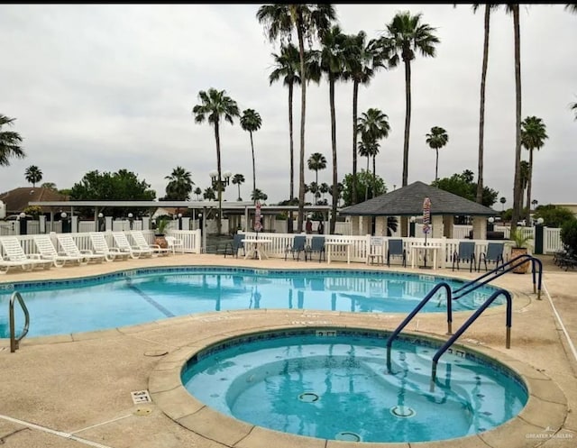 109 Green Gate Cir N, Palmview, TX 78572 - community pool with a patio area and a hot tub