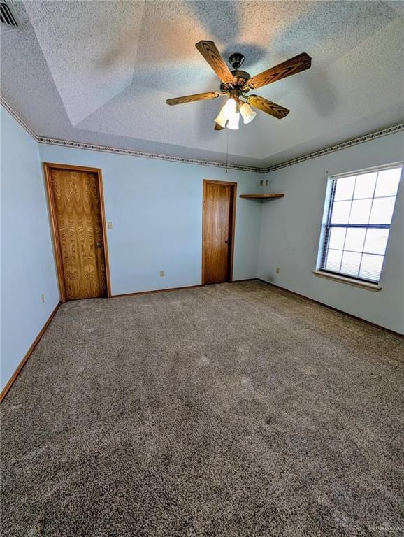 109 Green Gate Cir N, Palmview, TX 78572 - unfurnished bedroom with carpet flooring, a textured ceiling, a raised ceiling, and ceiling fan