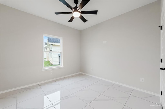 spare room featuring ceiling fan