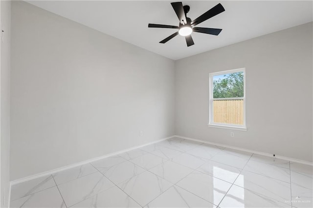 unfurnished room with ceiling fan