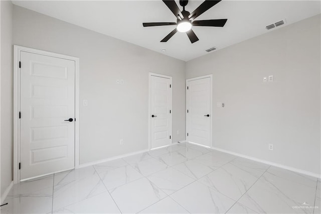 unfurnished room featuring ceiling fan