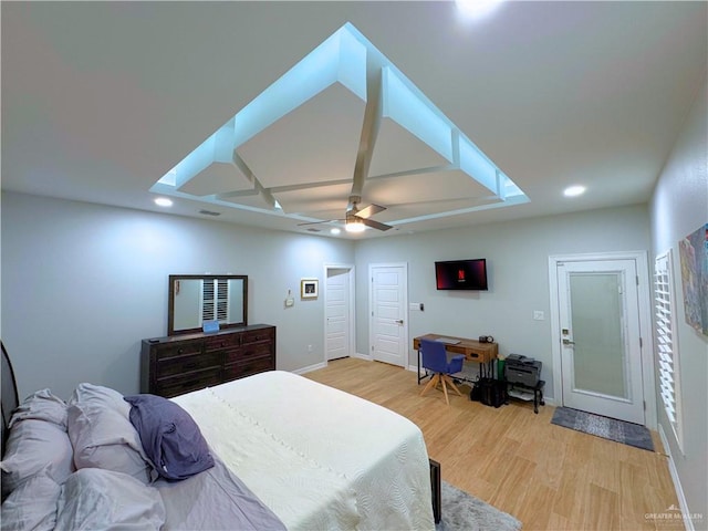 bedroom with ceiling fan and light wood-type flooring