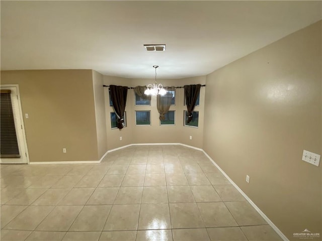8500 S Norma St, Pharr, TX 78577 - unfurnished room with baseboards, a notable chandelier, light tile patterned floors, and visible vents