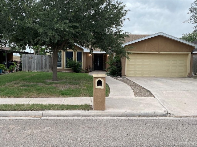 8500 S Norma St, Pharr, TX 78577 - single story home with a front yard, driveway, fence, and a garage