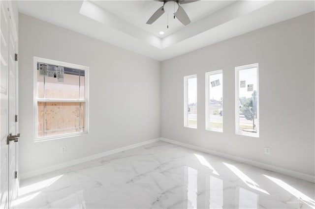 2208 Zinnia St, Weslaco, TX 78599 - spare room featuring healthy amount of natural light, recessed lighting, baseboards, marble finish floors, and ceiling fan