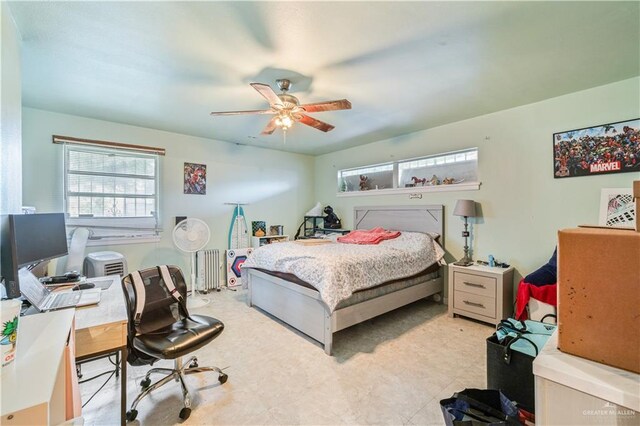 1601 Walnut Ave, Mcallen, TX 78501 - bedroom with radiator, an office area, and a ceiling fan