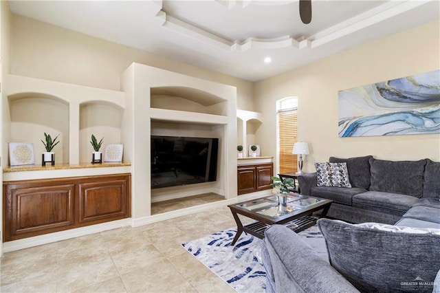 1625 Gabriels Lndg, Harlingen, TX 78550 - living area featuring built in shelves, a raised ceiling, and light tile patterned floors