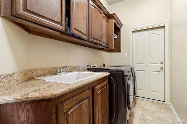 1625 Gabriels Lndg, Harlingen, TX 78550 - washroom with independent washer and dryer, cabinet space, and baseboards