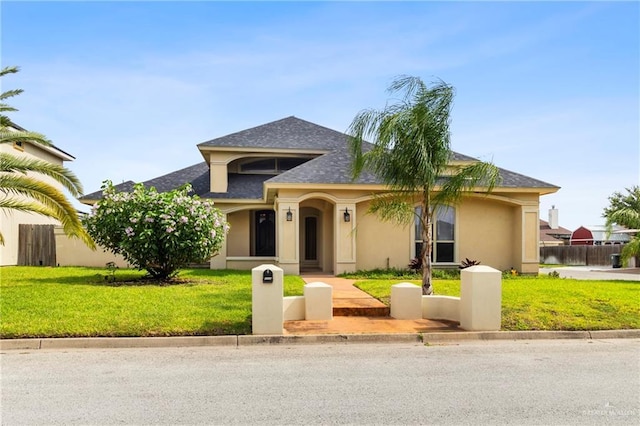 1625 Gabriels Lndg, Harlingen, TX 78550 - view of front of property featuring stucco siding and roof with shingles