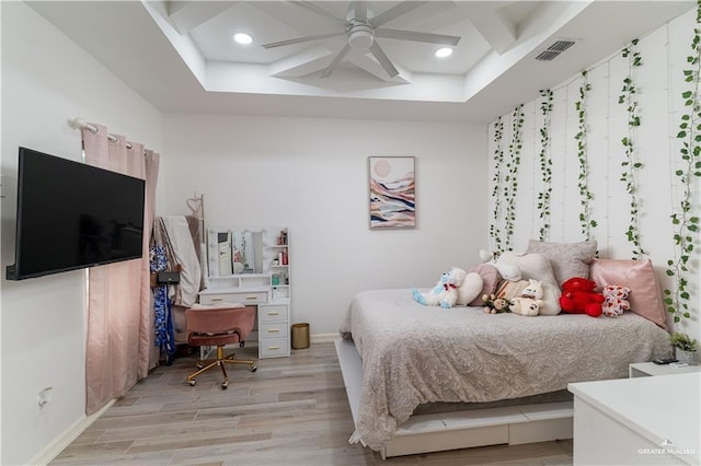 bedroom with ceiling fan and light wood-type flooring