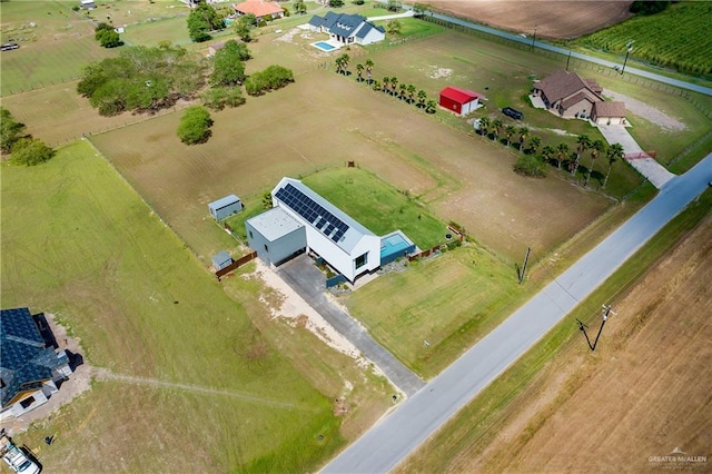 birds eye view of property featuring a rural view