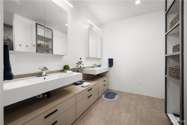 bathroom with vanity and tile patterned flooring