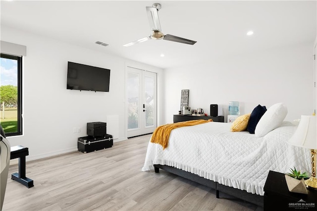 bedroom featuring french doors, ceiling fan, access to exterior, and light hardwood / wood-style flooring