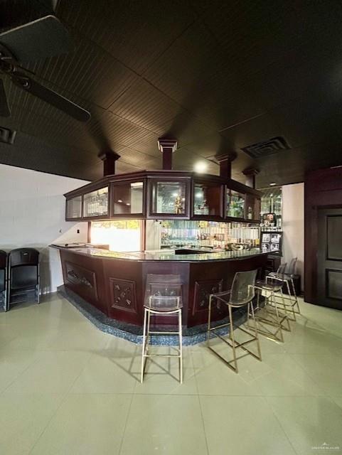 2417 E 28th St, Mission, TX 78574 - bar featuring tile patterned floors