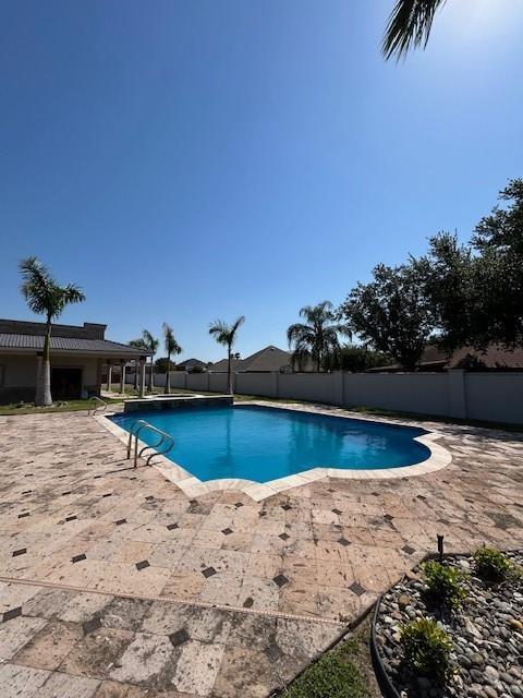 2417 E 28th St, Mission, TX 78574 - view of swimming pool with a fenced backyard and a patio