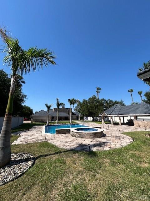 2417 E 28th St, Mission, TX 78574 - outdoor pool with an in-ground hot tub, a gazebo, a yard, and a patio area