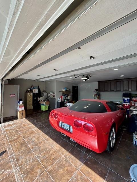 2417 E 28th St, Mission, TX 78574 - garage featuring a garage door opener