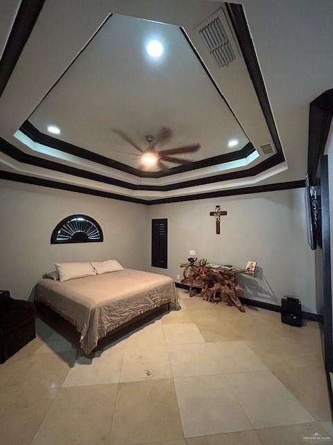2417 E 28th St, Mission, TX 78574 - bedroom with a tray ceiling, crown molding, a ceiling fan, and recessed lighting