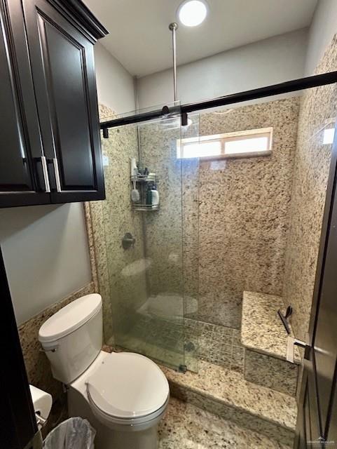 2417 E 28th St, Mission, TX 78574 - full bathroom with a stall shower and toilet