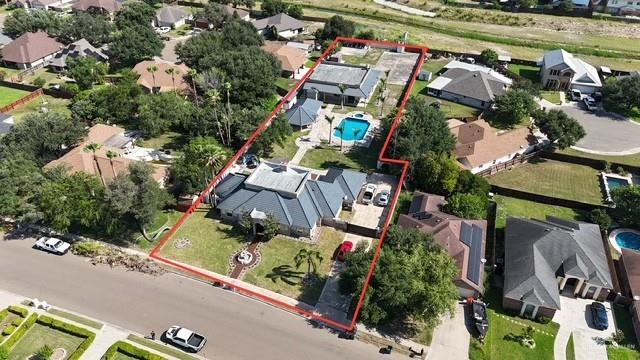2417 E 28th St, Mission, TX 78574 - aerial perspective of suburban area with property boundaries highlighted