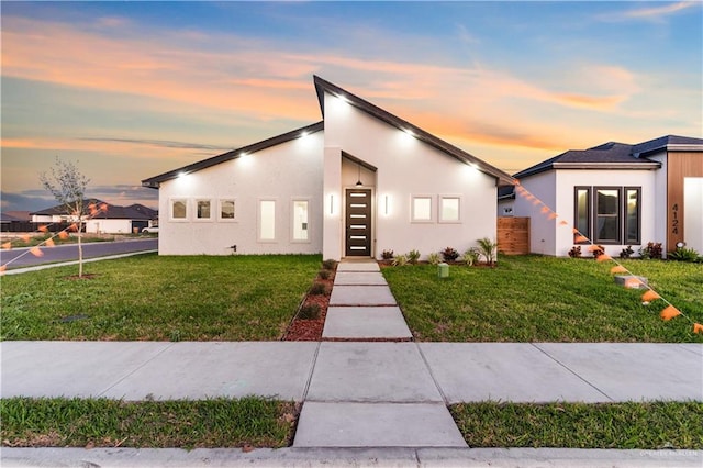 contemporary house with a yard