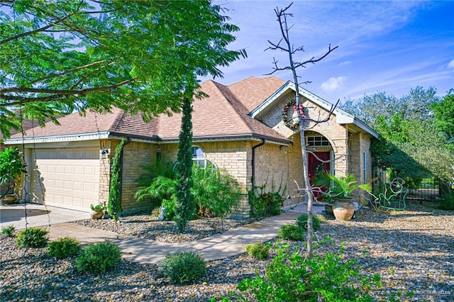 single story home featuring a garage