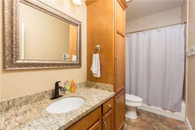 full bathroom featuring vanity, shower / bath combo, and toilet