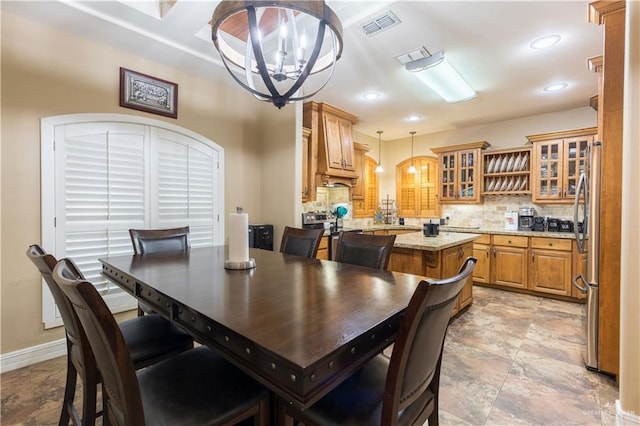 dining room with an inviting chandelier