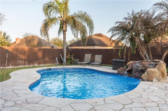 view of pool with a patio