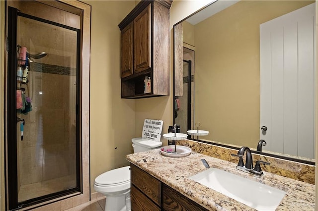1802 E Thompson Rd, Mission, TX 78573 - full bathroom featuring a shower stall, vanity, and tile patterned flooring