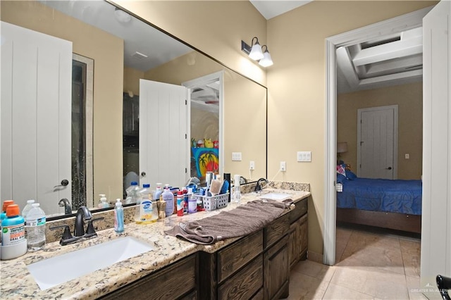 1802 E Thompson Rd, Mission, TX 78573 - ensuite bathroom featuring double vanity and tile patterned floors