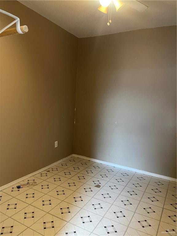 empty room with baseboards