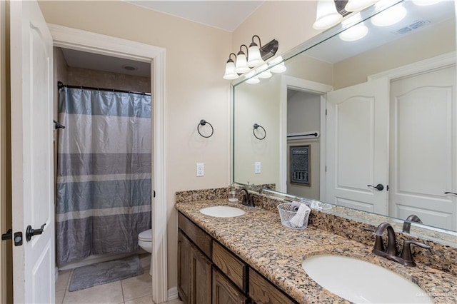 4517 Quail Ave, Mcallen, TX 78504 - full bath featuring double vanity, toilet, tile patterned flooring, and curtained shower