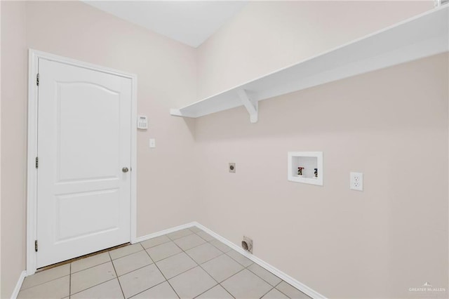 clothes washing area featuring washer hookup, hookup for an electric dryer, baseboards, and light tile patterned floors